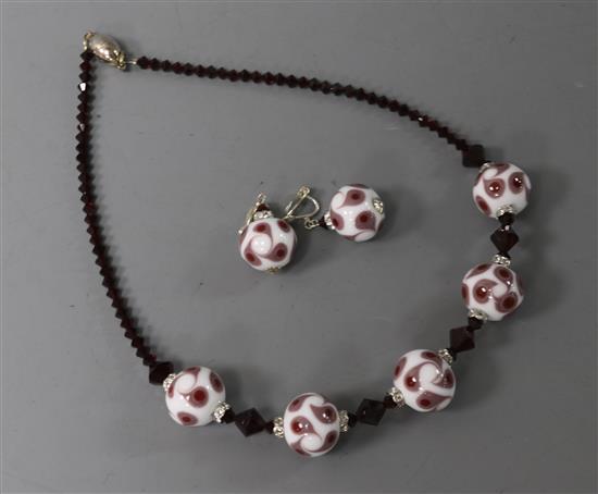 A fancy glass bead and paste set necklace and pair of matching earclips.